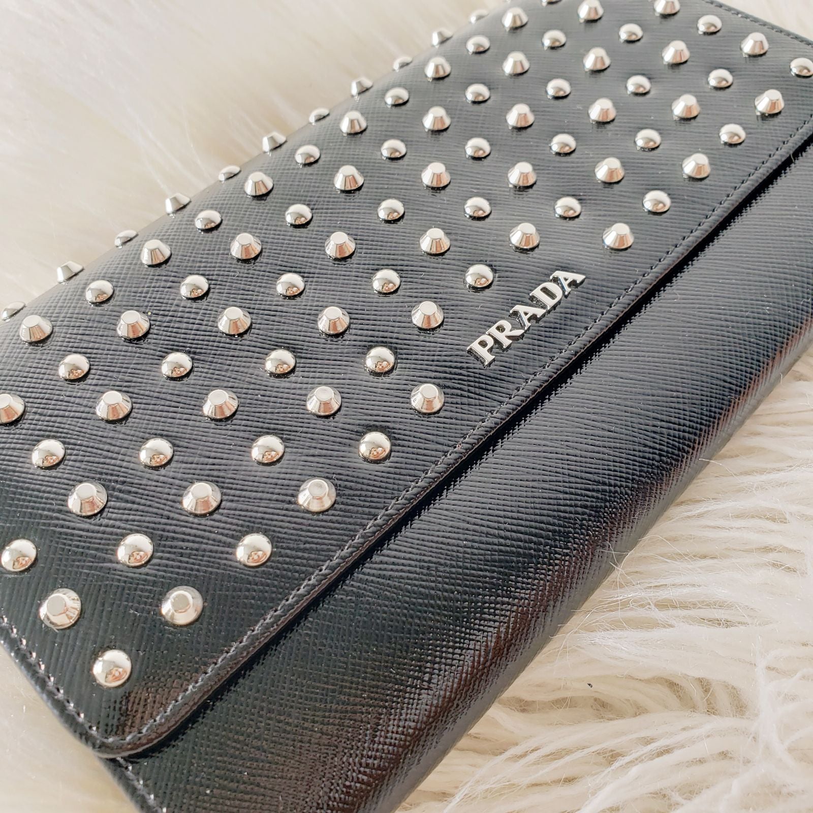 PRADA SAFFIANO VERNICE STUDDED CLUTCH